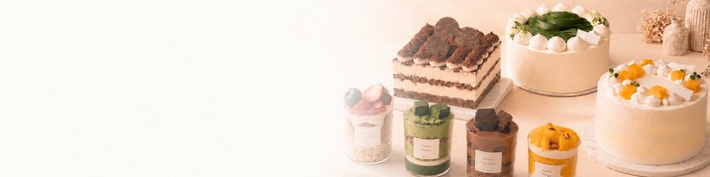 DECI PASTRY cakes and parfait cups arranged in a soft peach studio banner